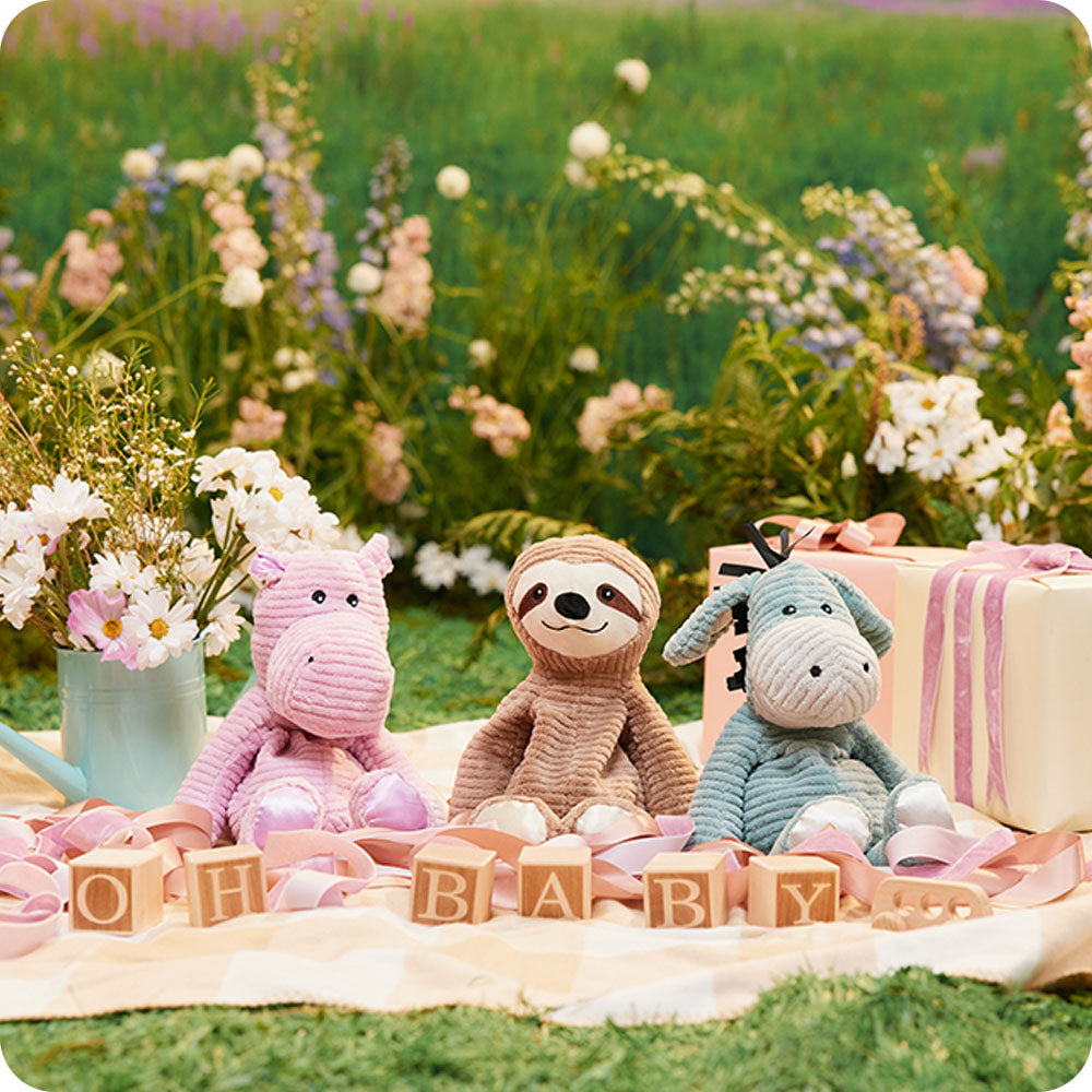 Image 99: my first warmies trio pig, sloth, and donkey in garden picnic setting